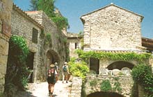 walk from famous fontaine vaucluse along the plague wall to gordes magnificent typical stone houses of provence medieval perched villages